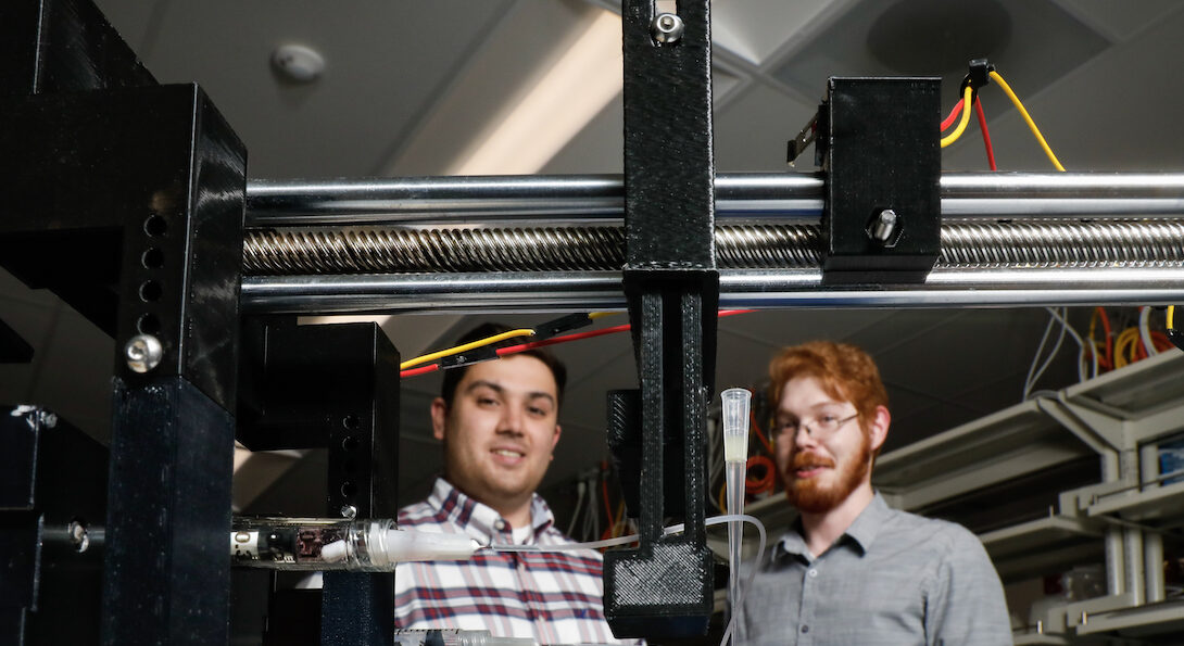 University of Illinois Chicago College of Engineering BME alumni Tommy Puttrich (L) and Stephen O'Donnell with a device to mix colloidal suspension.