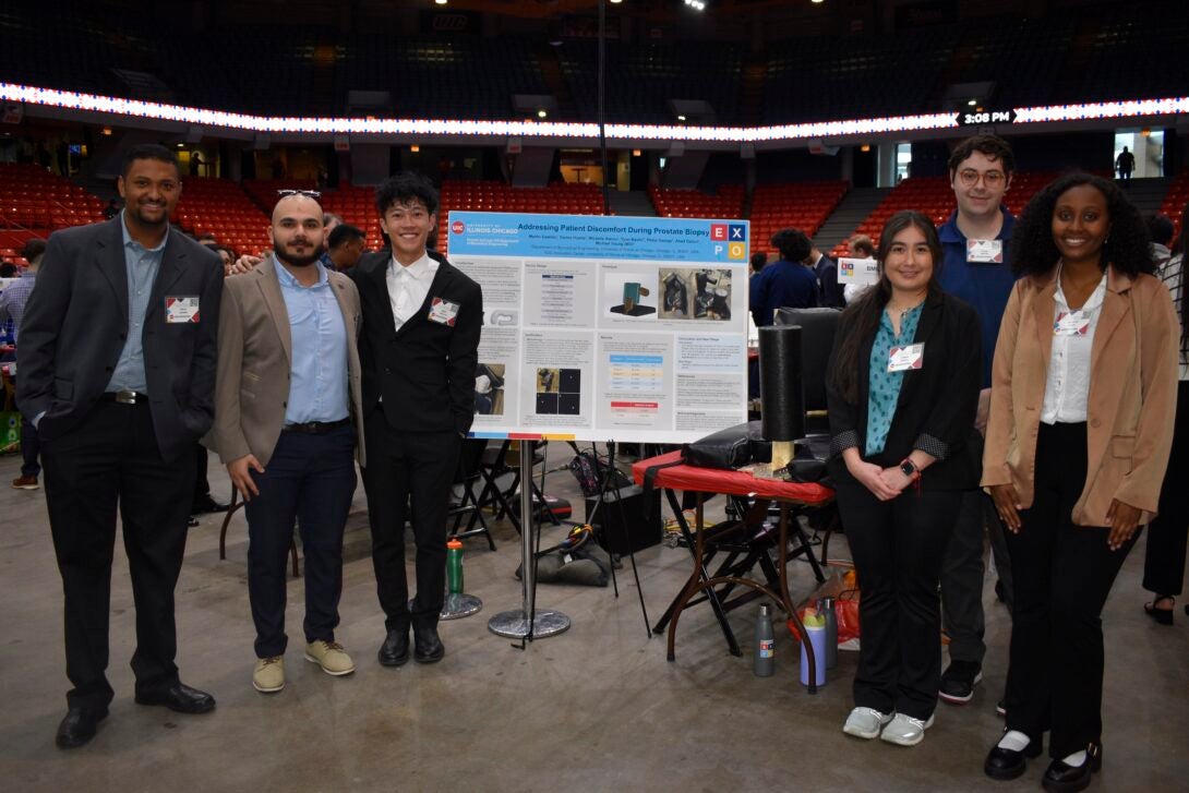 Philip George, Abed Daloul, Marti Castillo, Carina Huerta, Tyler Bastin, and Michelle Alemu show off their research poster at the annual Engineering Expo.