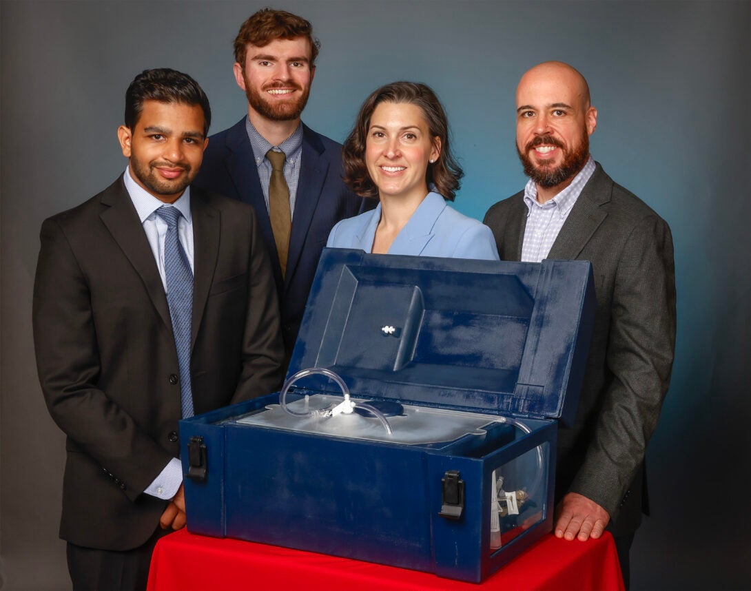 Sohil Amin, Danny Martin, Katie Buzenius and Jonathan Werderits with their prototype.