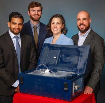 Sohil Amin, Danny Martin, Katie Buzenius and Jonathan Werderits with their prototype. 
