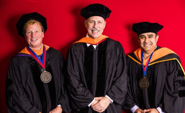 Former Dean Pete Nelson speaks at the investiture ceremony.