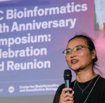 Clinical Assistant Professor Meishan Lin welcomes those who attended the UIC Bioinformatics 20th anniversary symposium 