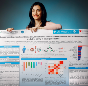 BME PhD student Tina Khajeh shows off her poster for the upcoming conference
                  